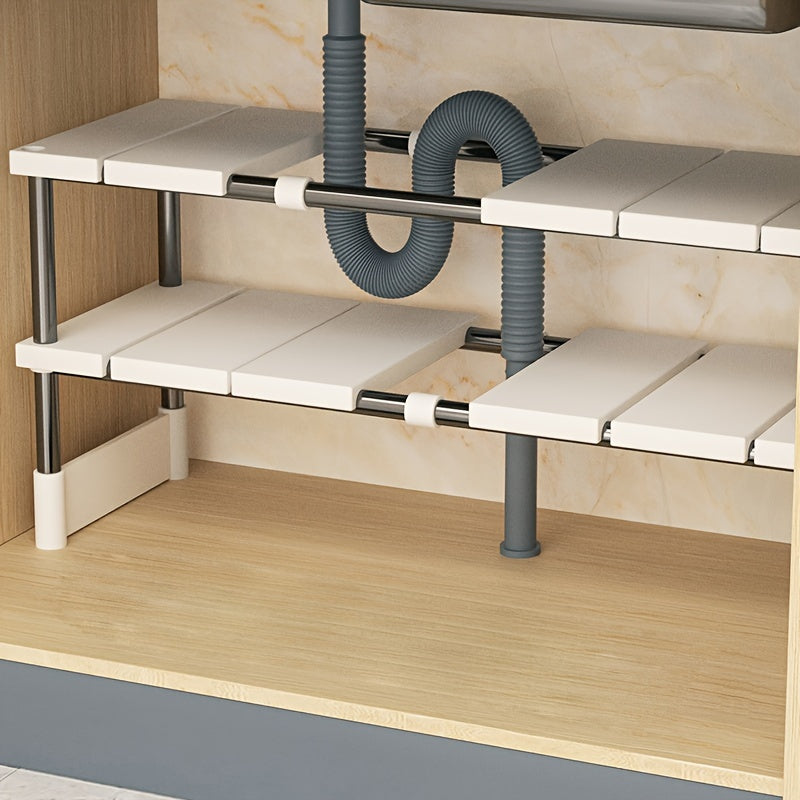 Organizador ajustable debajo del fregadero: acero inoxidable y plástico, estante de almacenamiento multicapa para gabinetes de cocina y baño, diseño que ahorra espacio.