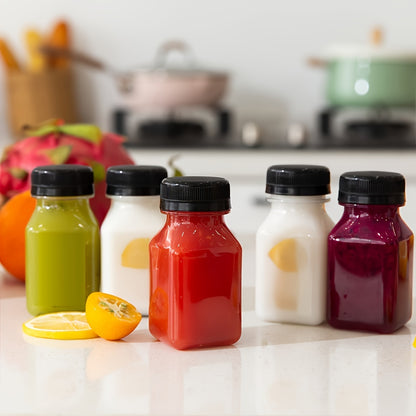 12 piezas, Botellas de Plástico para Jugo con Tapas, Contenedores de Jugo de Naranja de 4 oz para Refrigerador, Botellas Reutilizables para Batidos, Botellas de Agua Rellenables, Suministros para Actividades al Aire Libre, Artículos de Acampada.