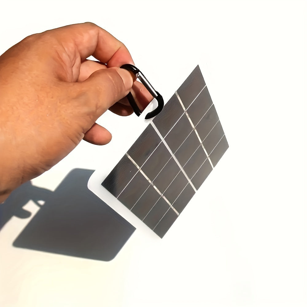 Panel de carga portátil solar de 1 pieza El cargador USB solar impermeable para exteriores es adecuado para viajes y campamentos al aire libre, energía móvil, banco de carga de teléfonos móviles, linterna, ventilador